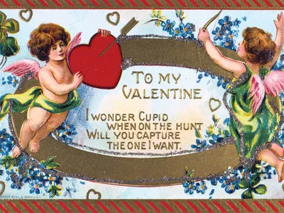 two cherubs holding a heart with the words to my valentine