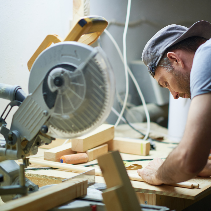 a man working on a project with a circular saw